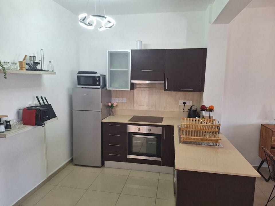Family Apartment | Private kitchen | Espresso maker, coffee/tea maker, full-size fridge, microwave