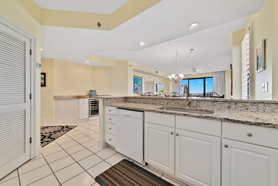 Clean lines and modern finishes define this well-appointed kitchen, offering a sleek and stylish cooking environment.