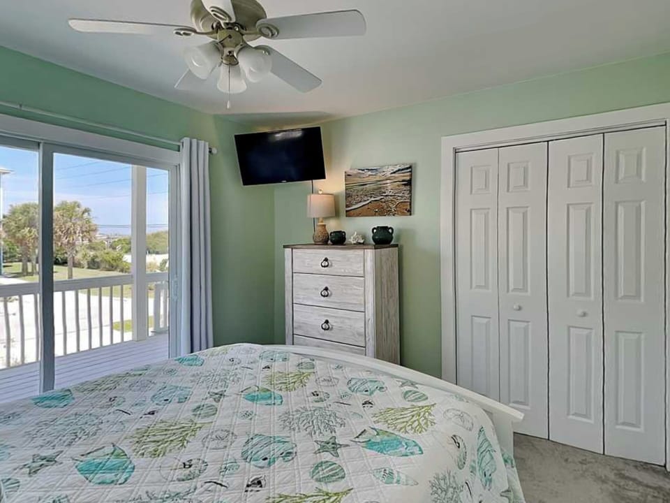 Fourth Bedroom - Queen Bed, TV + Balcony Access