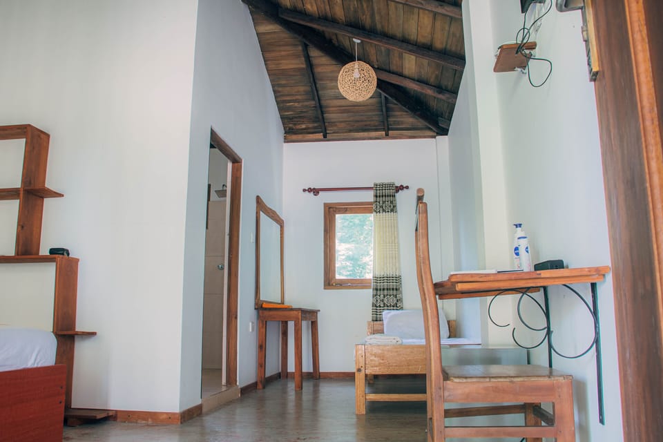 Triple Room, Smoking, Pool View | Down comforters, free WiFi