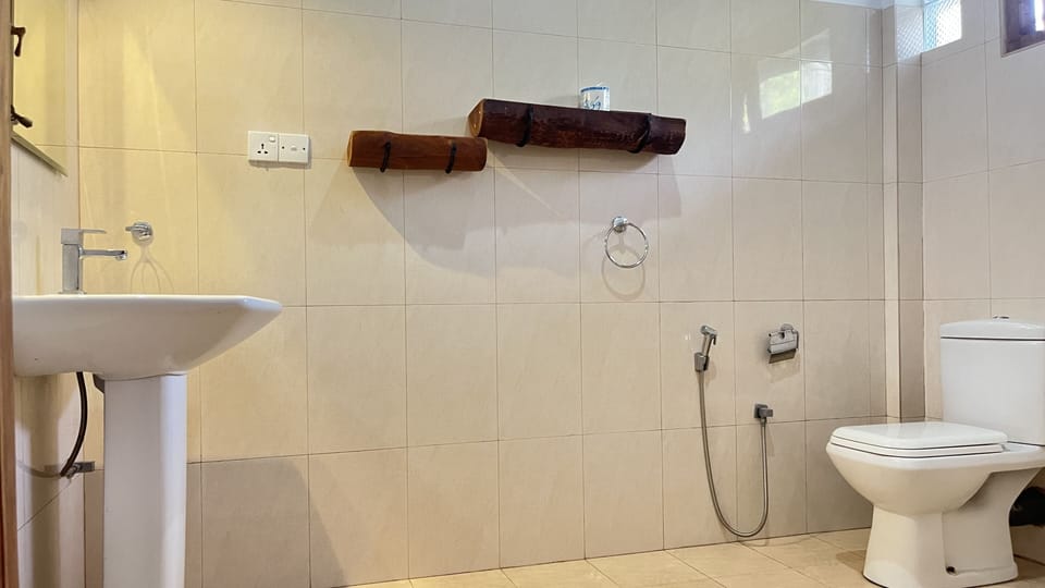 Triple Room, Smoking, Pool View | Bathroom | Shower, rainfall showerhead, free toiletries, hair dryer