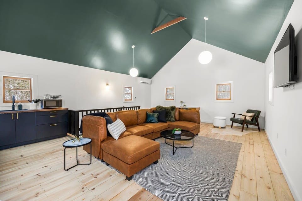 Open living room, dining, and kitchen