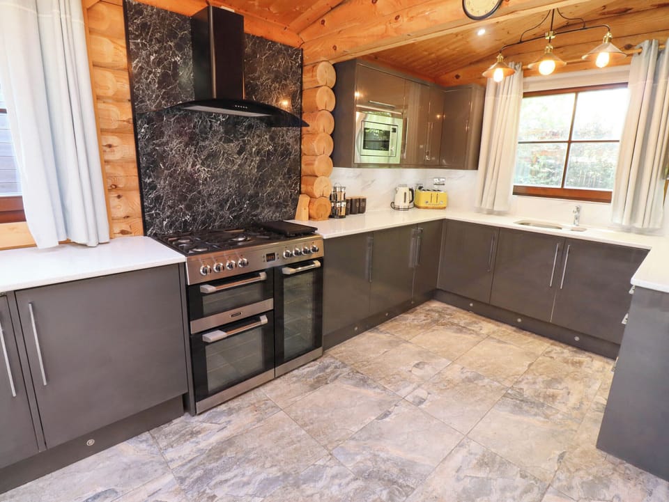Fridge, electric kettle, cookware/dishes/utensils