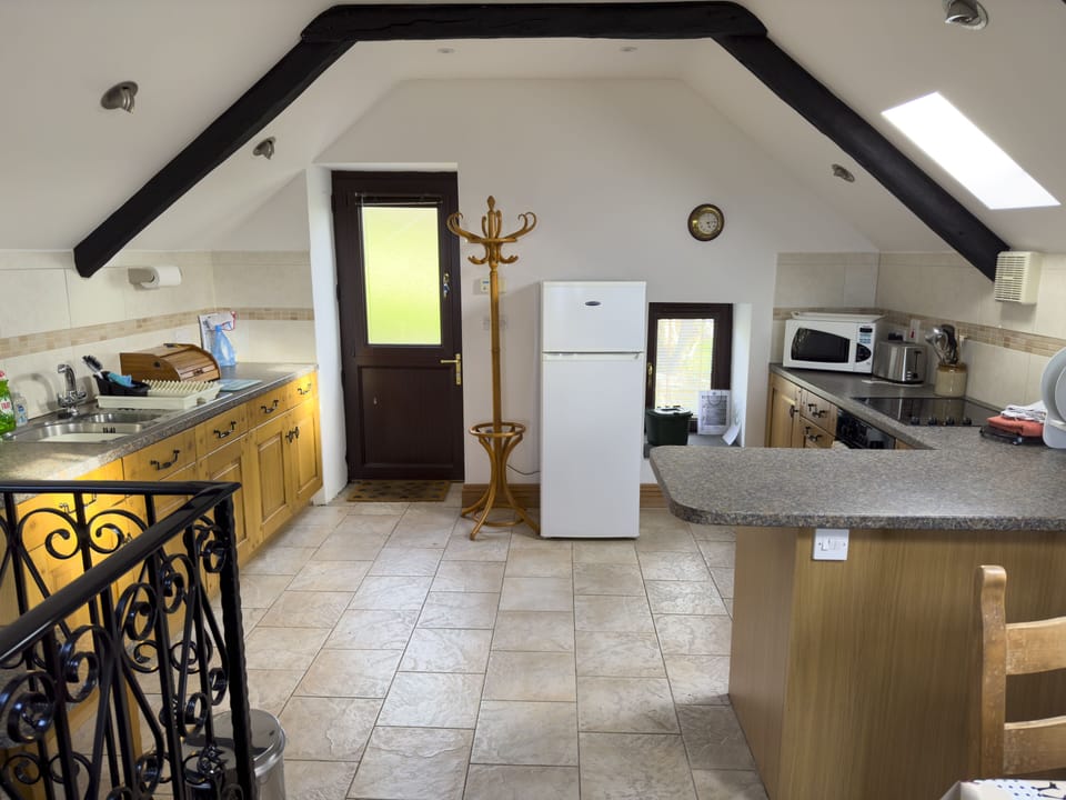 Fridge, electric kettle, toaster, cookware/dishes/utensils