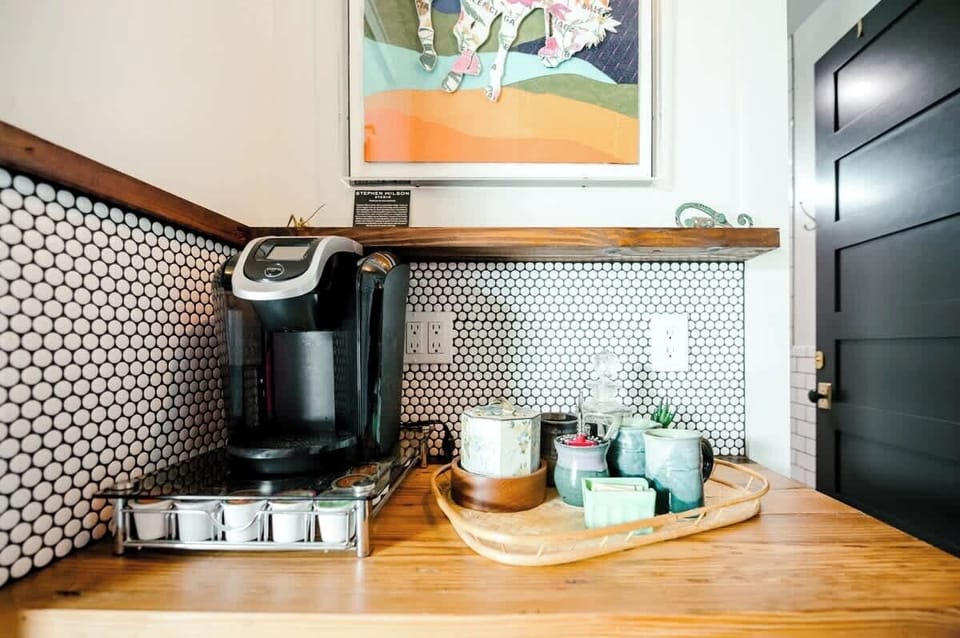 Between Bedroom #1 and #2 is a small coffee bar and mini-fridge!