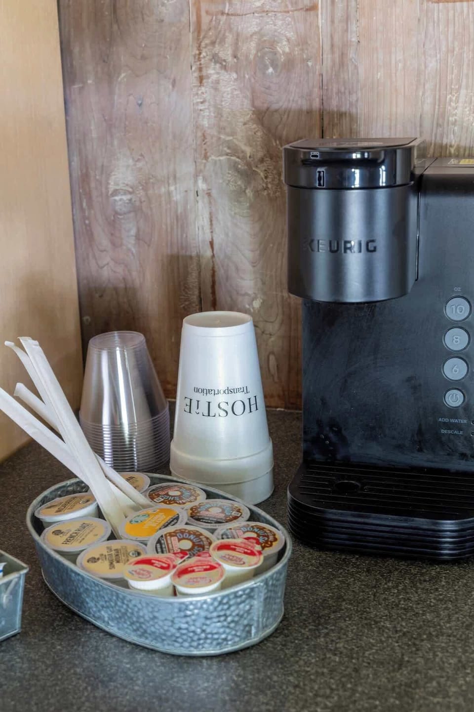 Keurig coffee maker. Coffee, cream, and sugar provided. 