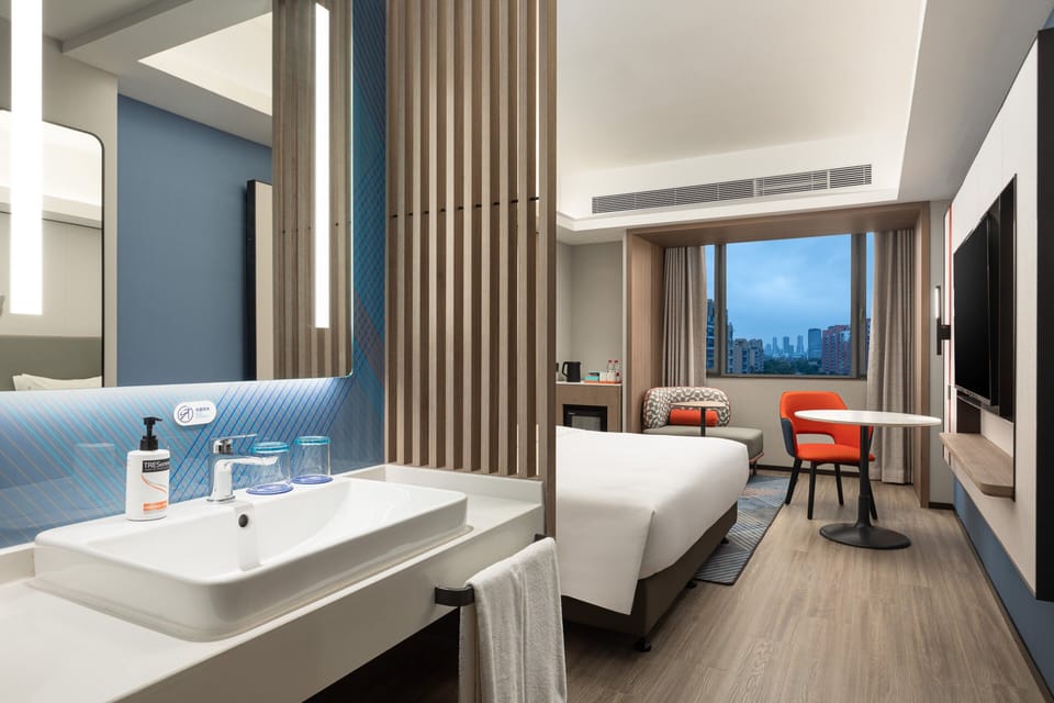 Premium bedding, down comforters, minibar, laptop workspace