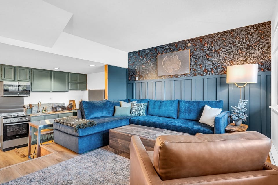 A cozy retreat awaits in this inviting space, where comfort and relaxation seamlessly intertwine.