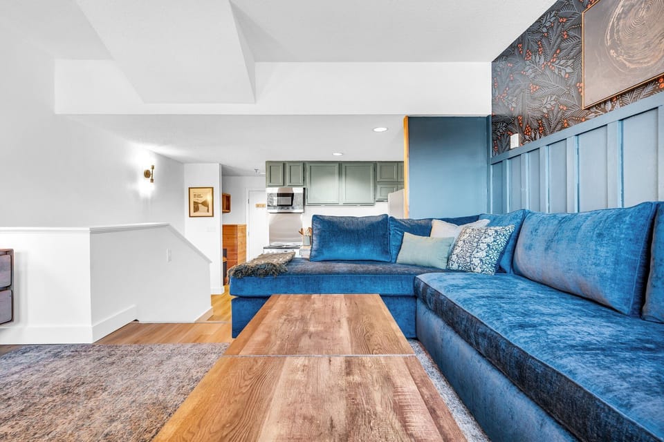 A cozy retreat awaits in this inviting space, where comfort and relaxation seamlessly intertwine.
