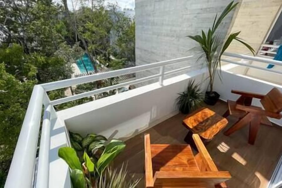 Private balcony: Stunning pool views, serene oasis.