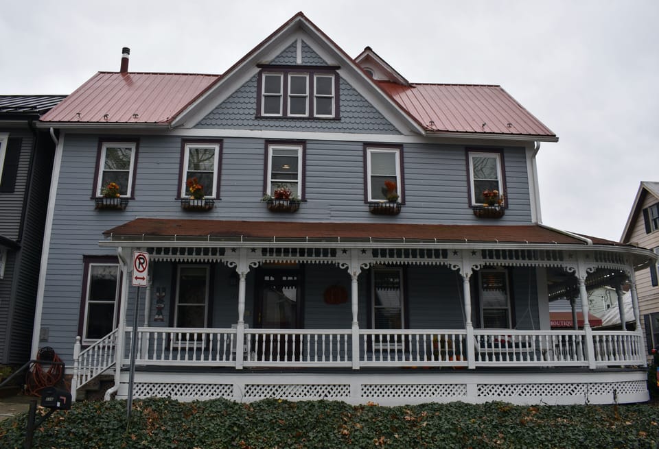 The Inn is a separate building with five guest rooms.
