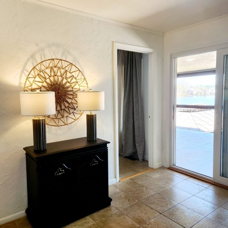 The dining area opens up to a large deck for outdoor dining as well! 