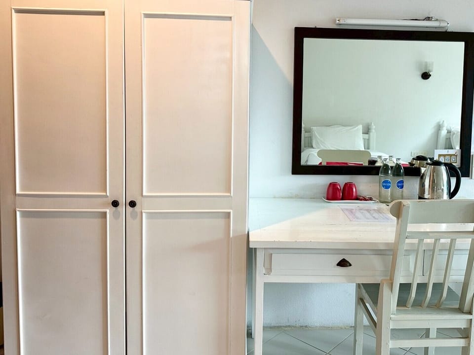 Desk, blackout drapes, WiFi (free), bed sheets