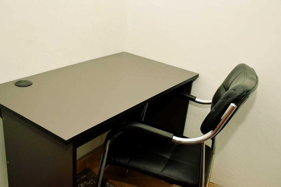 Business Apartment | Living area | 24-inch Smart TV with digital channels