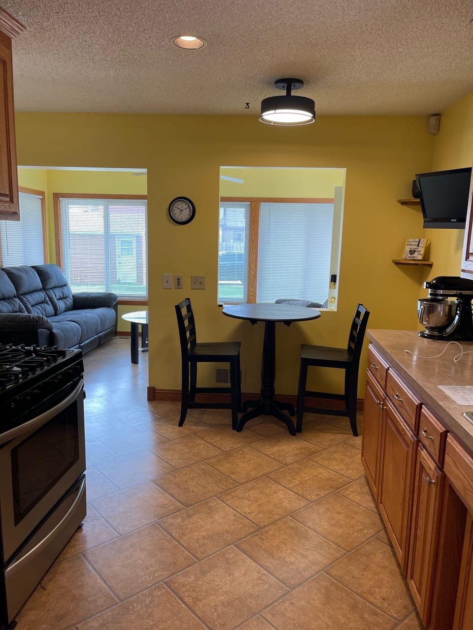 Kitchen facing sun room.