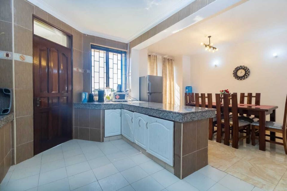 Family Apartment | Private kitchen | Fridge, microwave, cookware/dishes/utensils