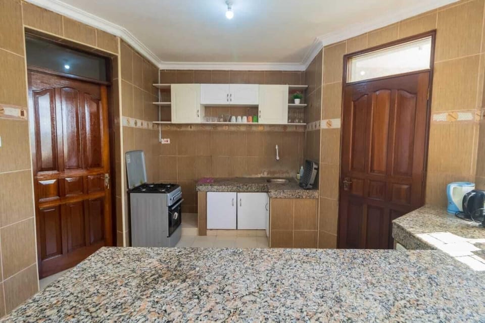 Family Apartment | Private kitchen | Fridge, microwave, cookware/dishes/utensils
