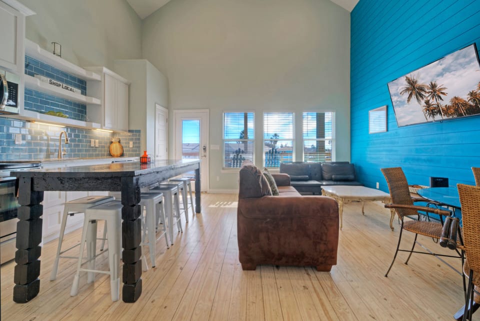 Open floor plan living area with abundant natural light.