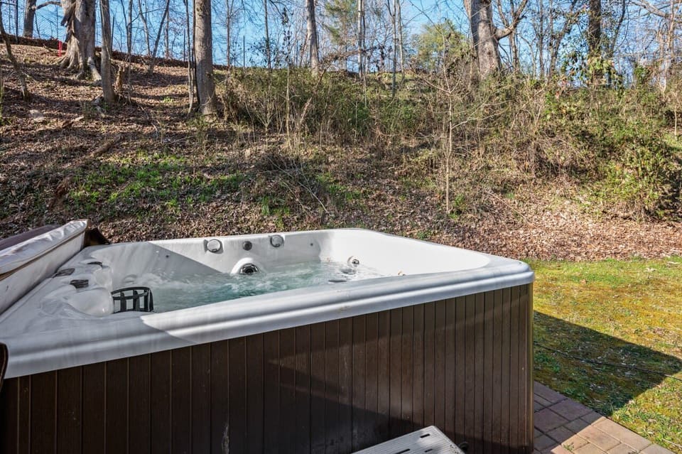 Relax and rejuvenate surrounded by nature in our inviting hot tub oasis!