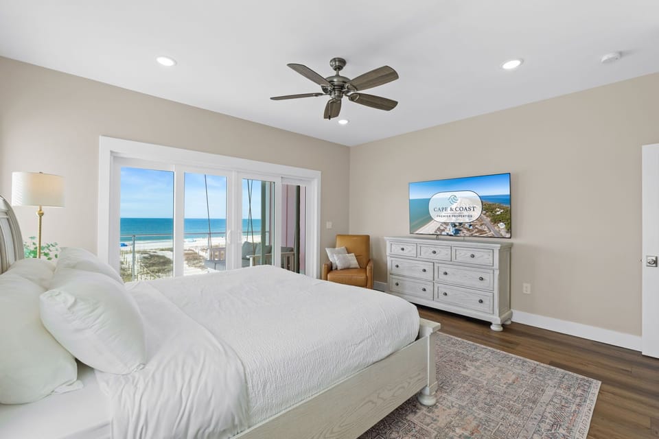 Wake up to stunning ocean views from your private bedroom retreat, where gentle sea breezes and coastal comfort create the perfect escape.
