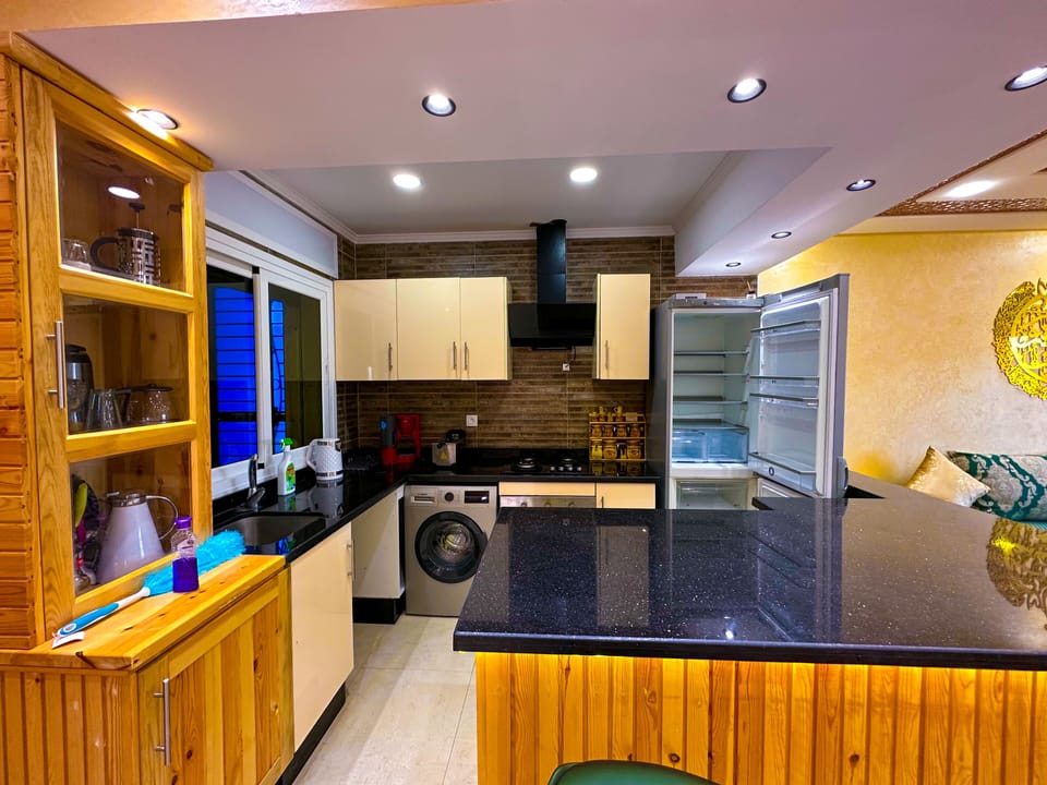 Comfort Apartment | Private kitchen | Full-size fridge, oven, stovetop, electric kettle