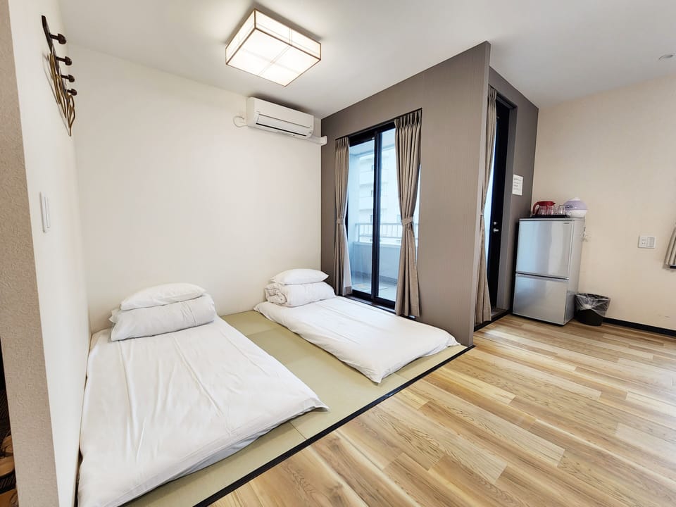 Blackout drapes, iron/ironing board, free WiFi, bed sheets