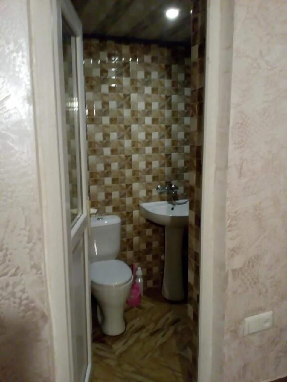 Separate tub and shower, free toiletries, hair dryer, slippers