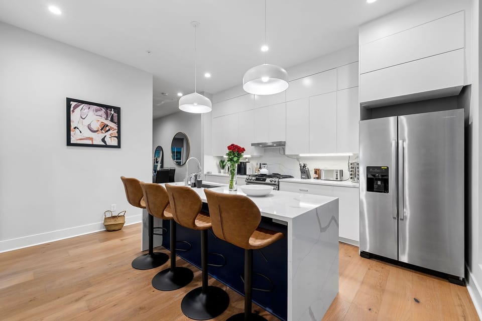 Beautifully design kitchen with all stainless steel appliances and amenities including: 

Rice cooker, air fryer, Blender, Instance Coffee Maker, Coffee grinder, Whisker, measuring cups, baking pan set, complete set of pots and pans, dishes, silverware, oven, assorted spicerack with 40+ spices, and more