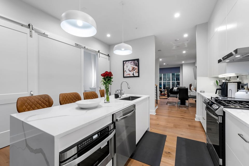 Beautifully design kitchen with all stainless steel appliances and amenities including: 

Rice cooker, air fryer, Blender, Instance Coffee Maker, Coffee grinder, Whisker, measuring cups, baking pan set, complete set of pots and pans, dishes, silverware, oven, assorted spicerack with 40+ spices, and more