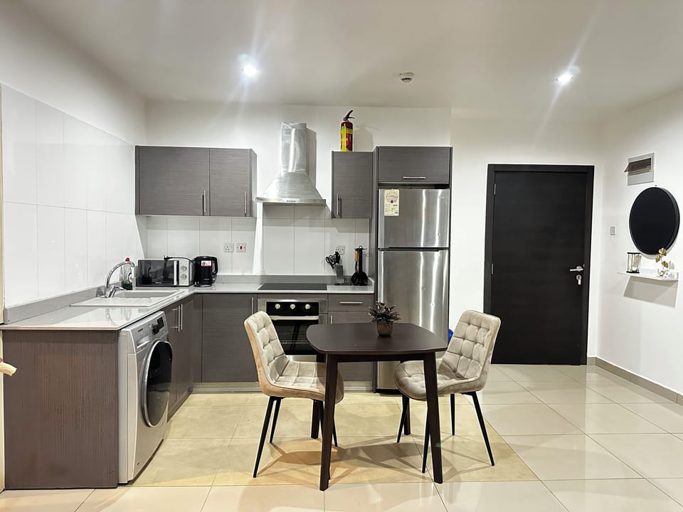 Apartment | Private kitchen | Full-size fridge, microwave, oven, stovetop