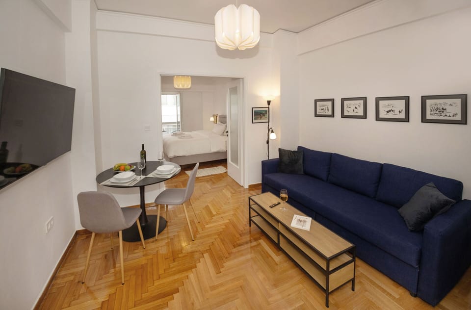Comfort Apartment | Living area | 50-inch Smart TV with digital channels