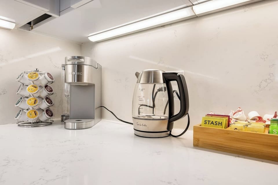 Get caffeinated with our Keurig coffee maker. Tea packets, cream and Splenda are also readily available. :)