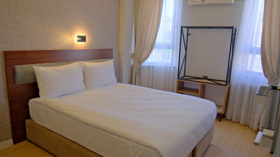 Standard Double Room | Premium bedding, down comforters, soundproofing