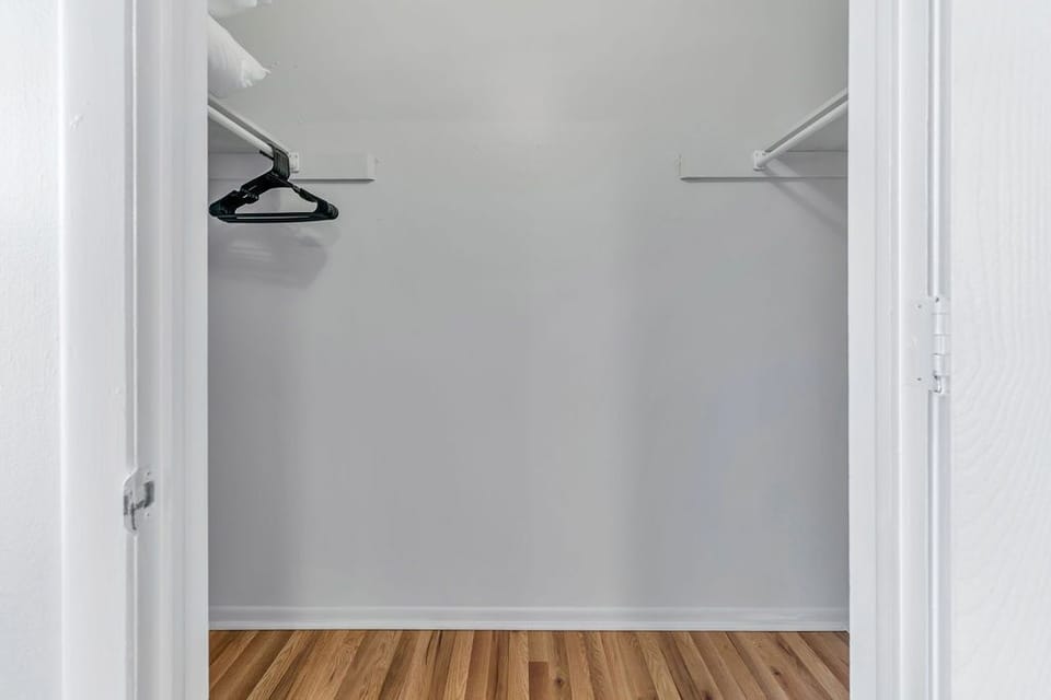 Main bedroom closet is spacious enough for two people's belongings.  