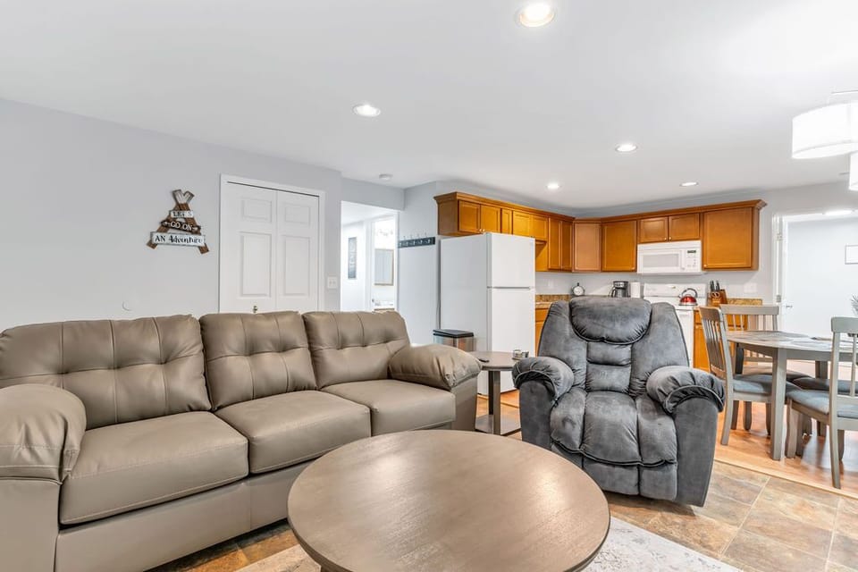 Spacious living room with cozy furniture.