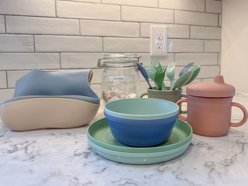 We include a variety of items for kids, like bibs, plates, cups, and utensils.