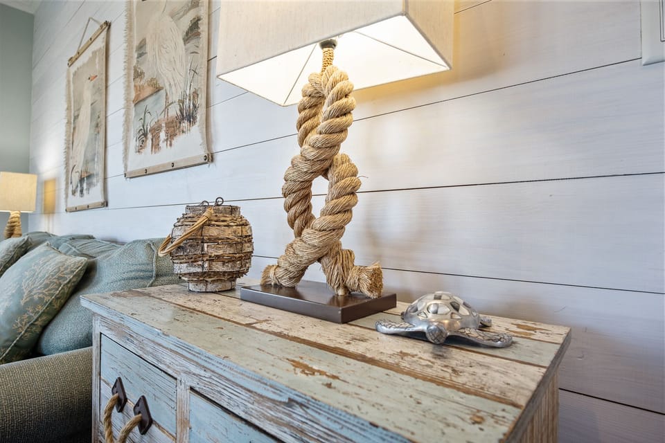 Pineapple Paradise Living Room: Unwind in luxury in this coastal haven, where every detail is designed for your comfort and enjoyment.