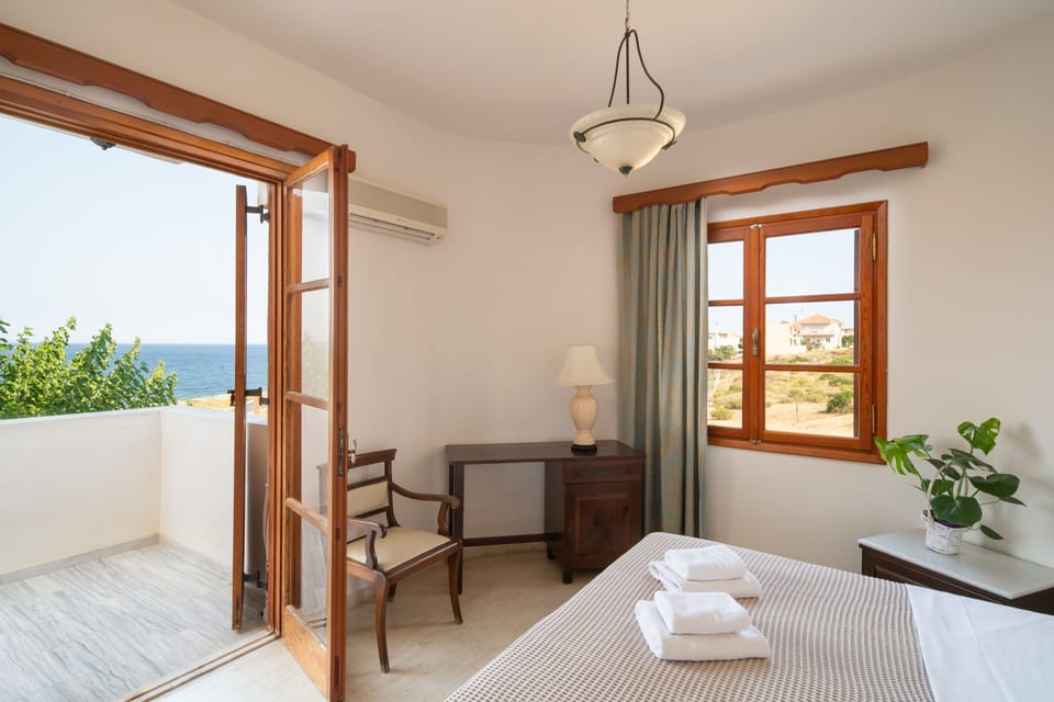 Family Apartment, Sea View | Individually decorated, desk, laptop workspace, iron/ironing board