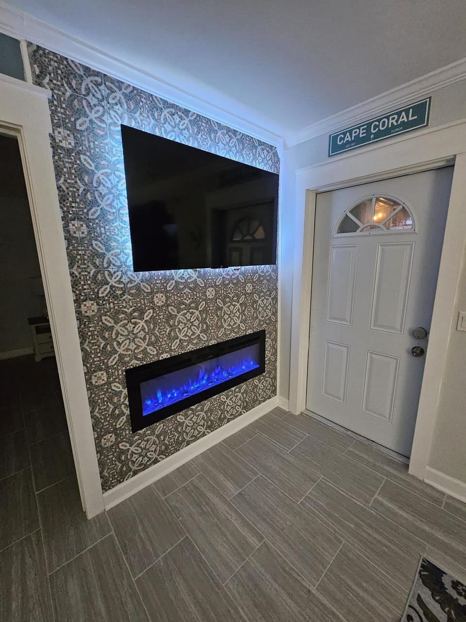 Relax with the LED fireplace and 55" Smart TV.