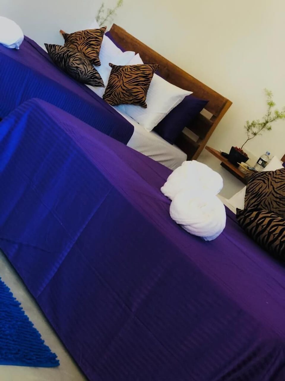 Deluxe Quadruple Room | Desk, iron/ironing board