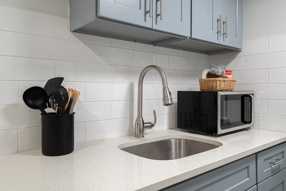 Small in size, big on function. Our fully equipped kitchen features space-saving appliances and all the essentials needed to whip up a gourmet meal