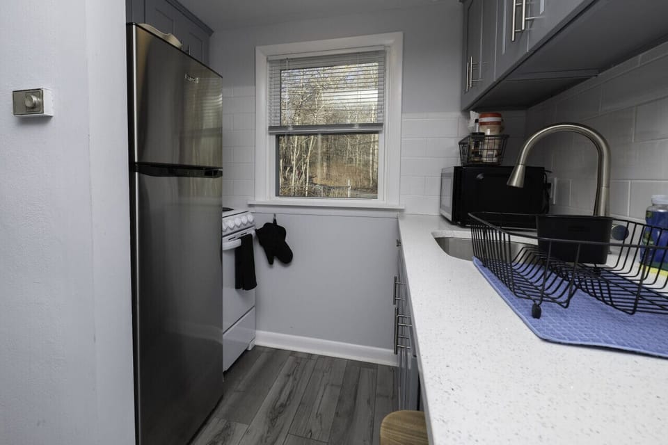 Small in size, big on function. Our fully equipped kitchen features space-saving appliances and all the essentials needed to whip up a gourmet meal