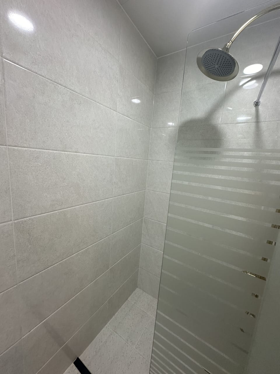 Shower, designer toiletries, hair dryer, bathrobes