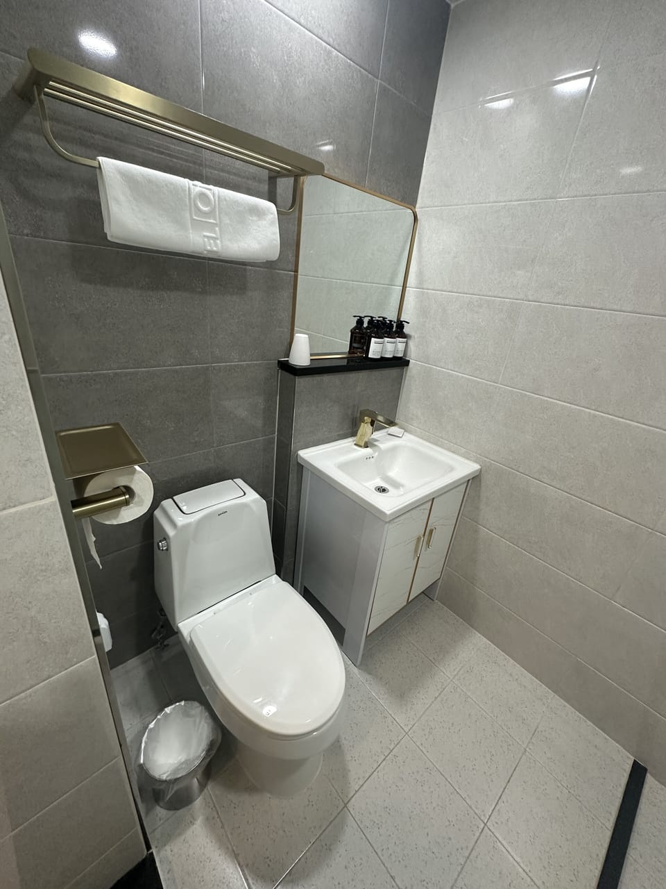 Shower, designer toiletries, hair dryer, bathrobes