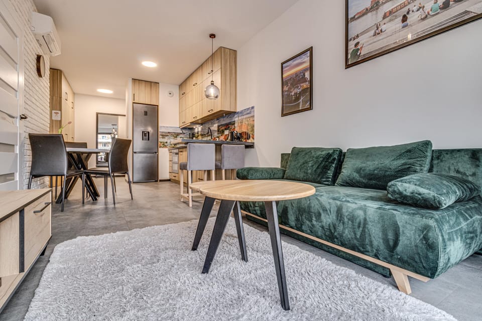 City Apartment | Living room | 37-inch flat-screen TV with digital channels