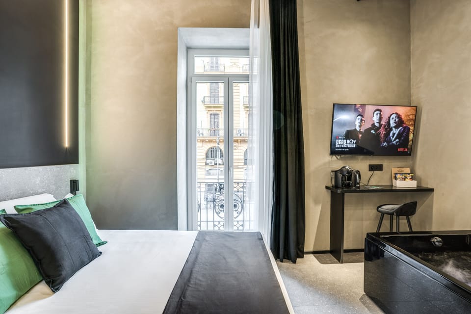 Elite Suite | 1 bedroom, down comforters, individually decorated, laptop workspace