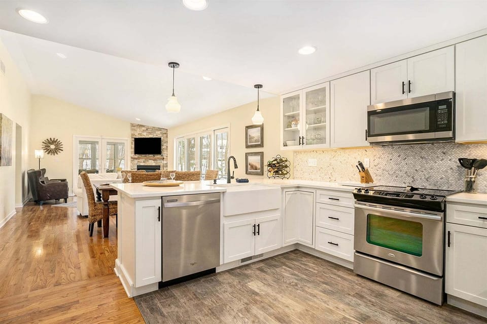 Open kitchen, dining, and living space is bright and welcoming