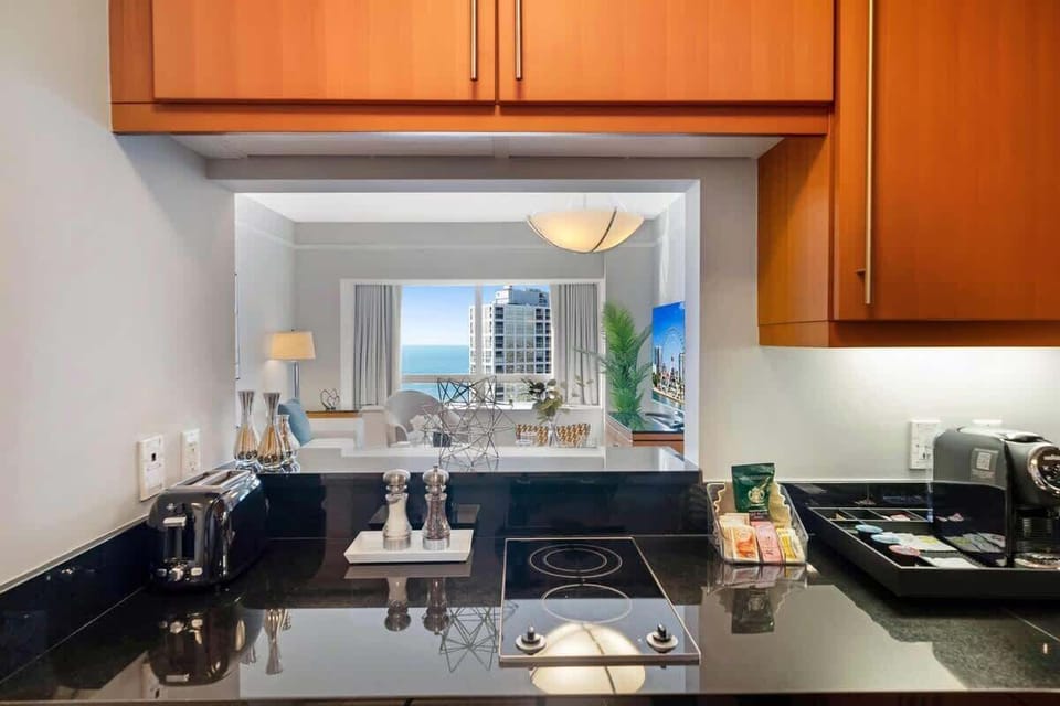 Modern Miami Kitchen Retreat: Step into this fully furnished kitchen, where modern design meets functionality. A stylish space that makes preparing meals a delight, ensuring your stay is as comfortable as it is luxurious.