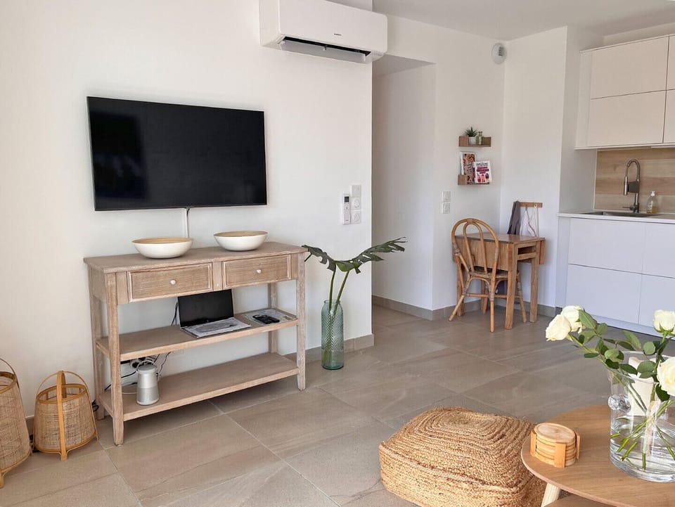 The living room and the kitchen