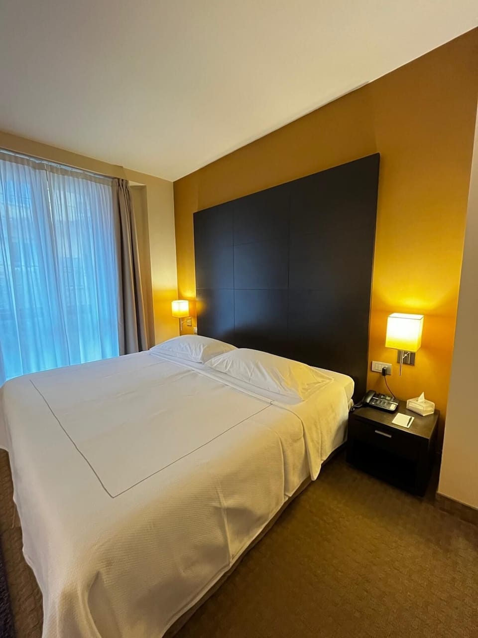 Deluxe Room, 1 King Bed | In-room safe, desk, laptop workspace, soundproofing